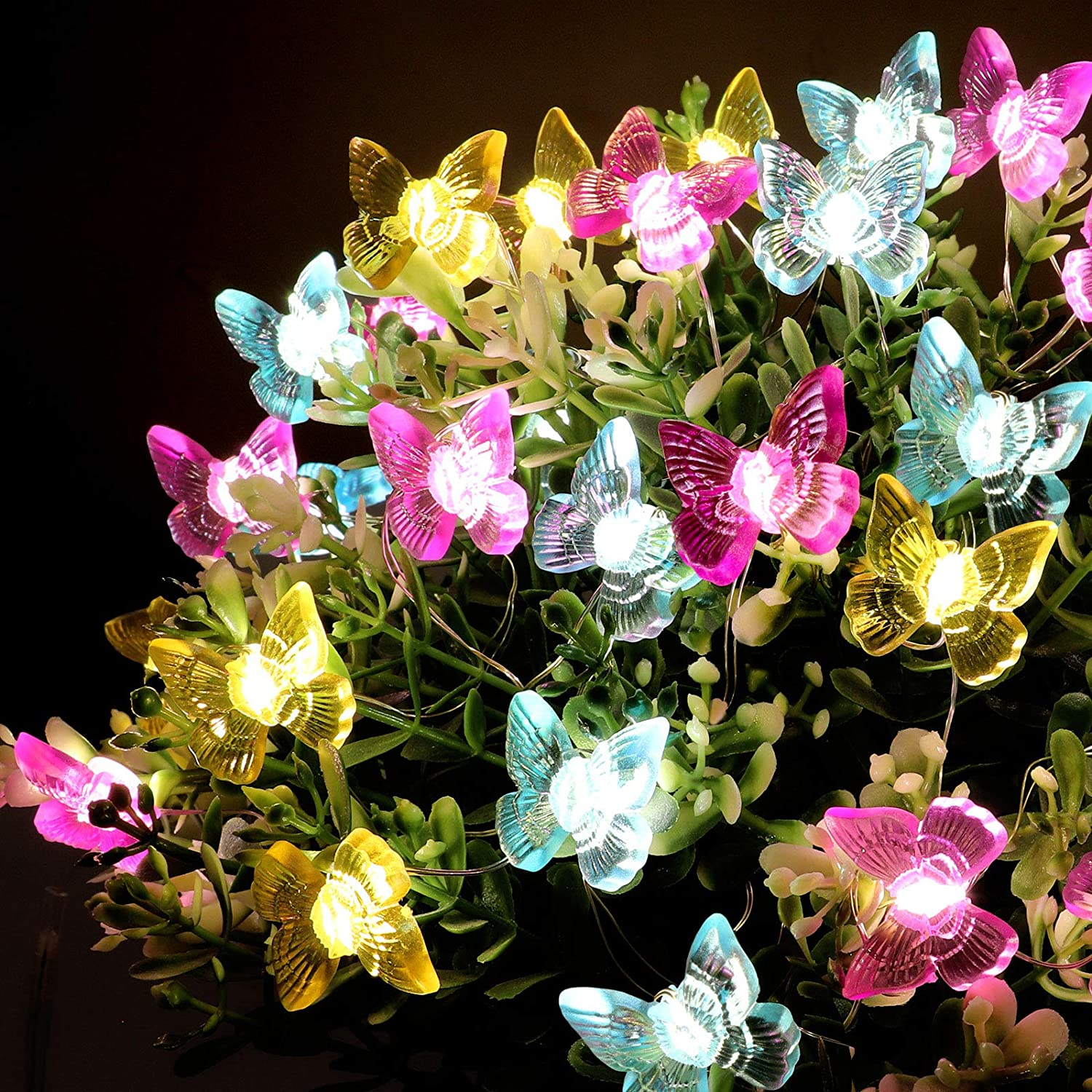 Colorful Butterfly LED String Lights with 30 LEDs on copper wire, showcasing pink, yellow, and blue butterflies for festive decoration.