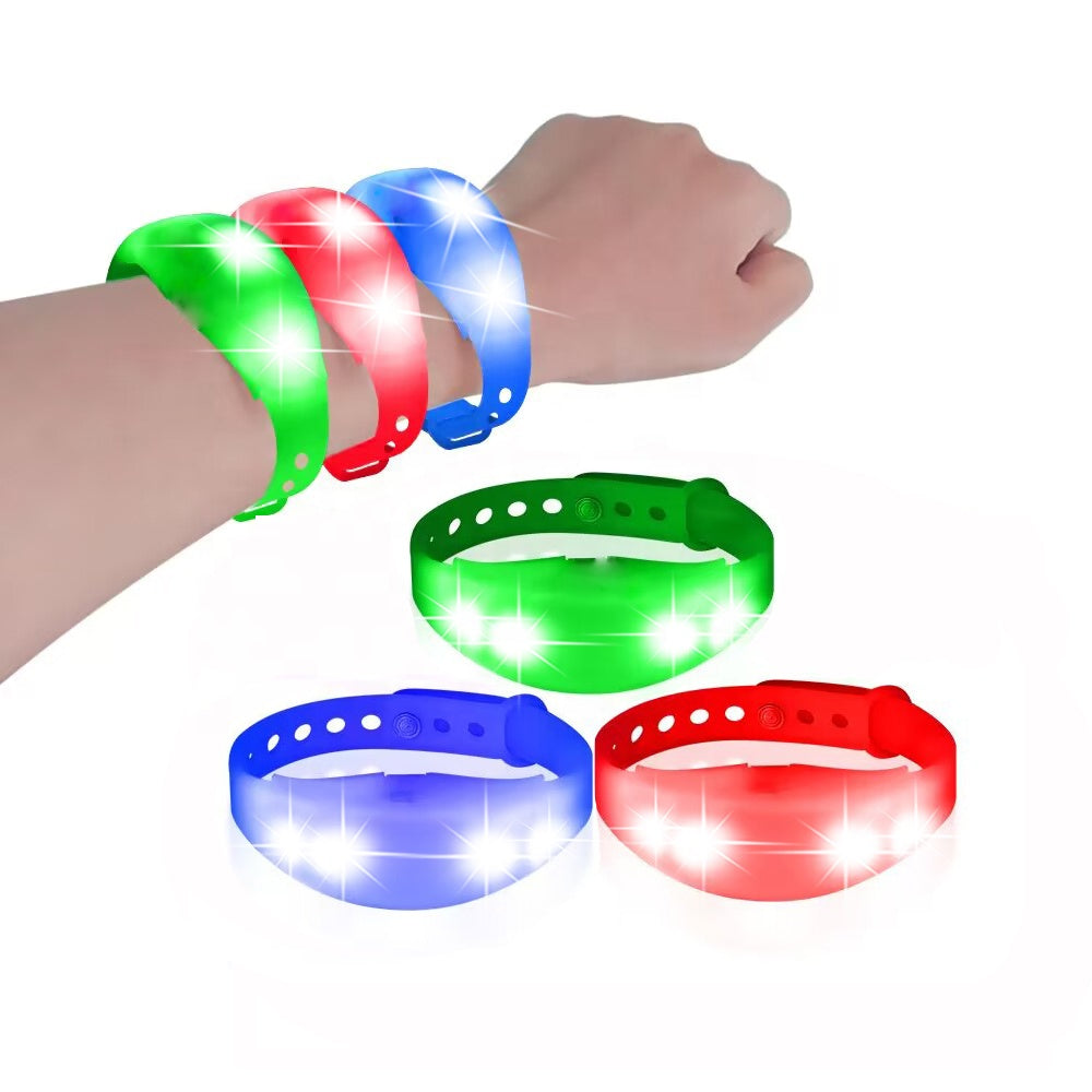 Wholesale GFB004 Remote Control Adjustable Wristband LED Bracelets in various colors, showcasing their vibrant LED lights and adjustable silicone design.