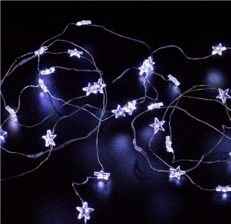 A string of 30 LED star-shaped fairy lights glowing brightly, showcasing their silver wire and waterproof design, perfect for indoor and outdoor decoration.