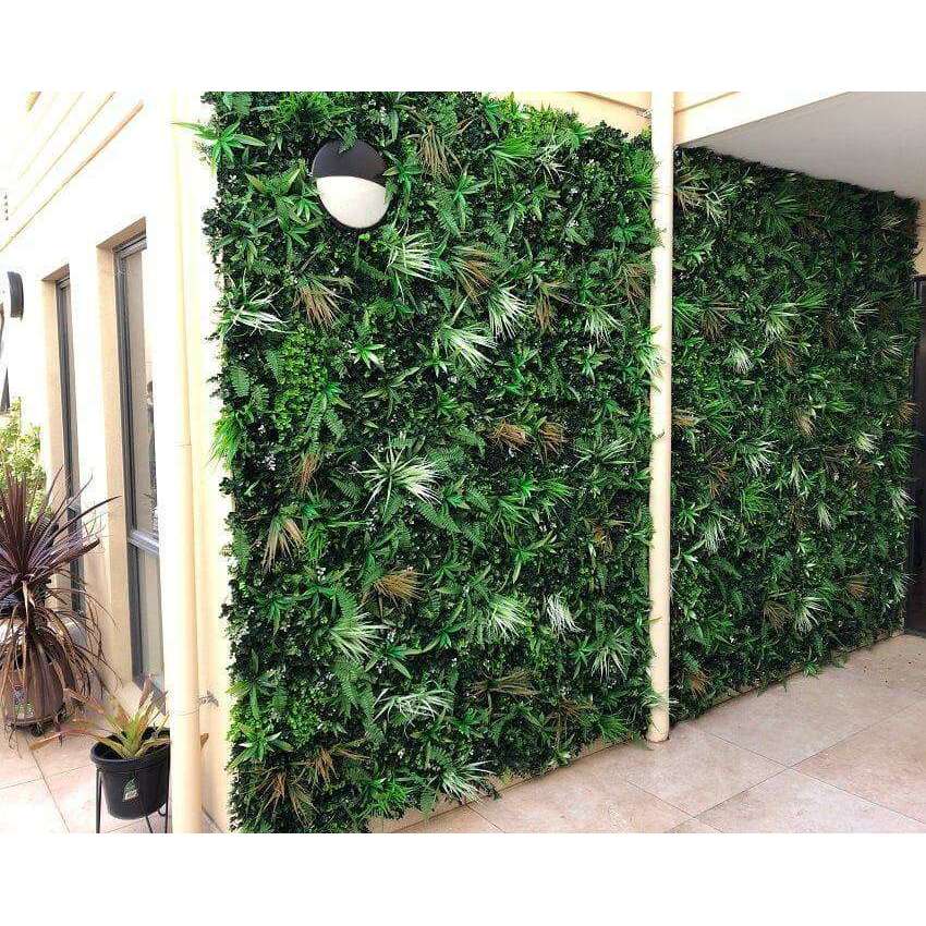 Wild Tropics Artificial Vertical Garden, a lush 1m x 1m green wall featuring vibrant tropical plants, perfect for indoor and outdoor decoration.