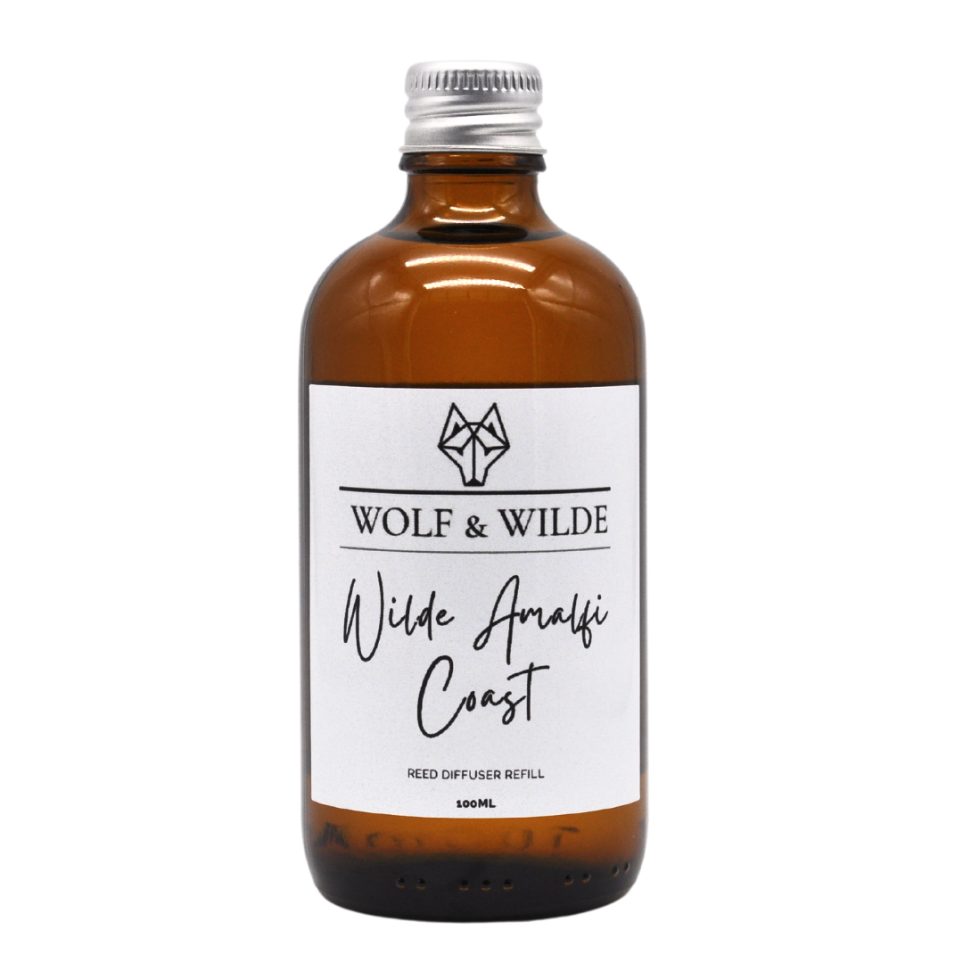 Wilde Amalfi Coast 100ML Luxury Reed Diffuser Refill in elegant amber glass with aluminium cap, showcasing its stylish design.