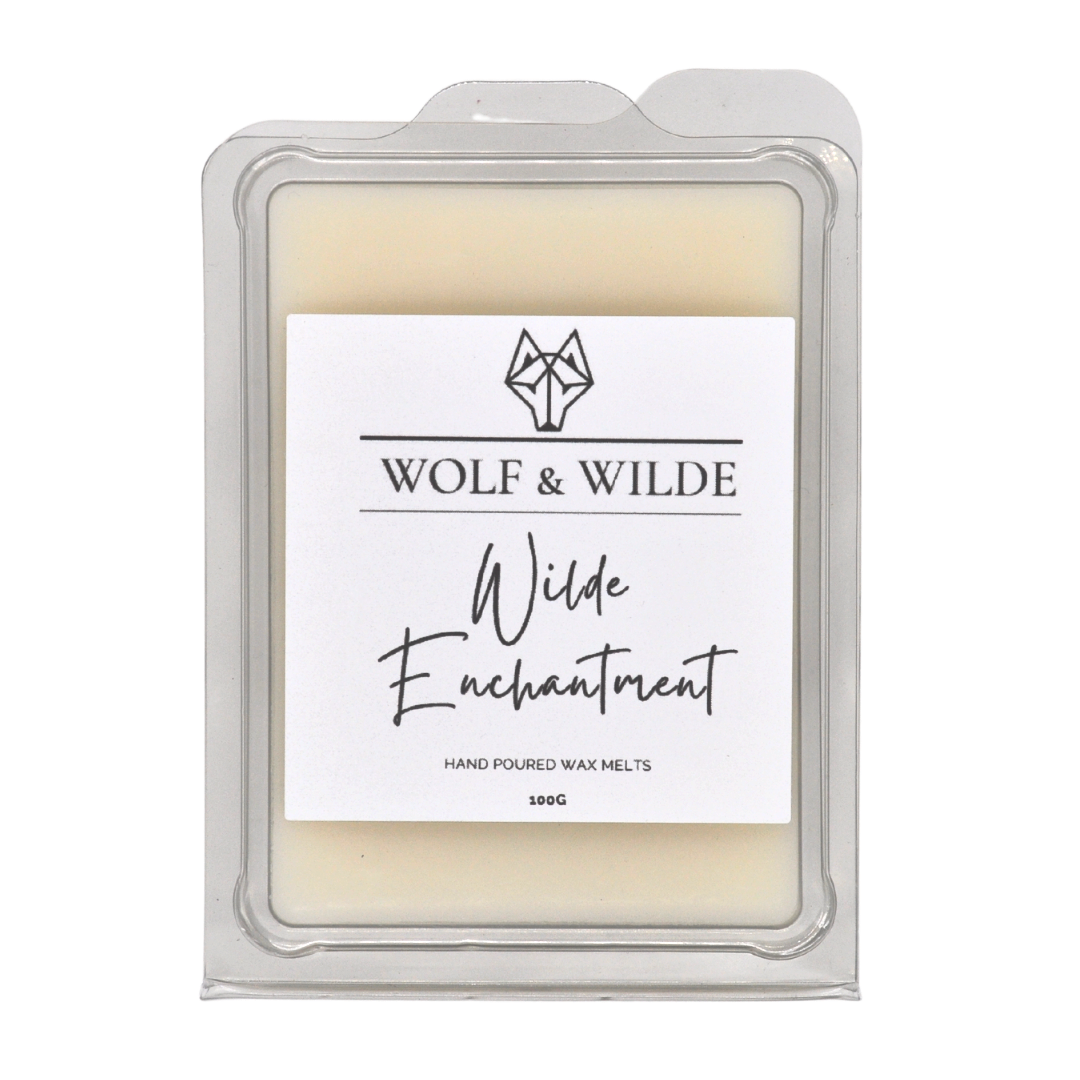 Wilde Enchantment Soy Wax Melts in a decorative package, showcasing a blend of floral and earthy scents.
