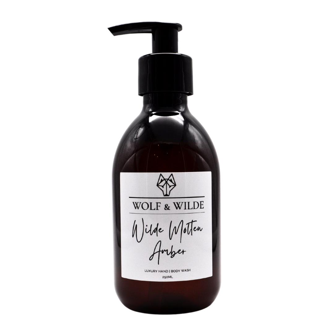 Wilde Molten Amber Luxury 2 In 1 Liquid Soap in a recyclable amber bottle, showcasing its rich, warm color and elegant design.