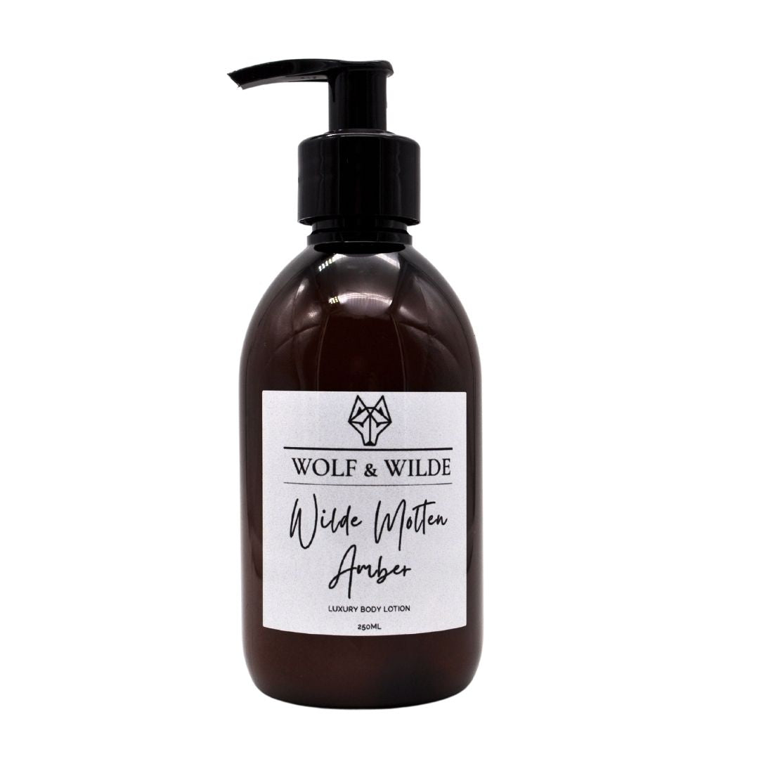 Wilde Molten Amber Luxury Body Lotion 250ML in an amber PET bottle, showcasing its rich texture and luxurious packaging.