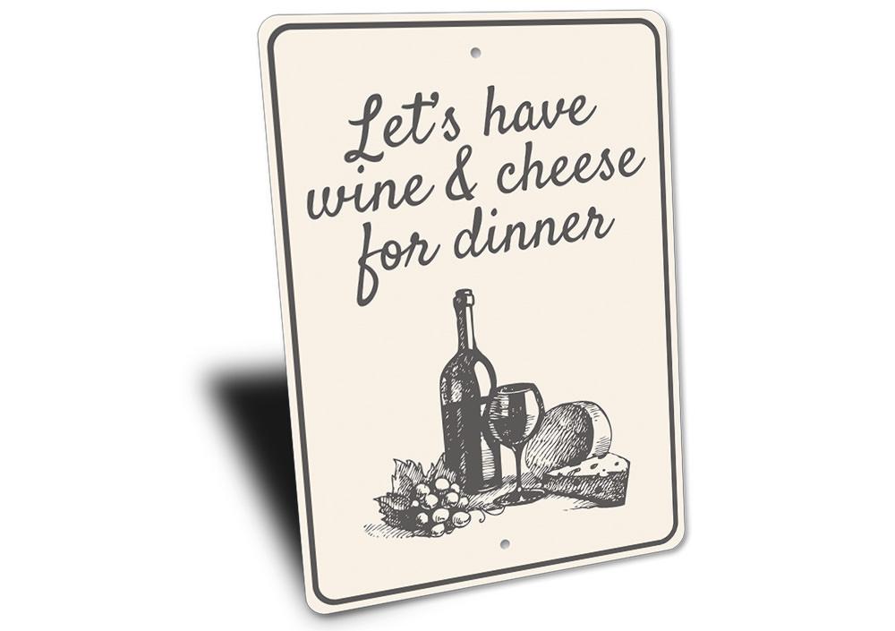 A decorative Wine & Cheese Sign made of high-quality aluminum, featuring elegant typography and a rustic design, perfect for kitchens or dining areas.