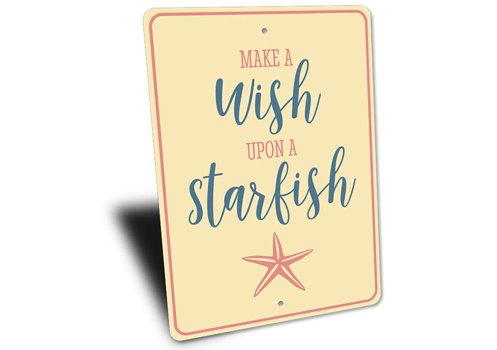 A decorative metal sign featuring a starfish design, perfect for beach-themed decor, showcasing vibrant colors and customizable text options.