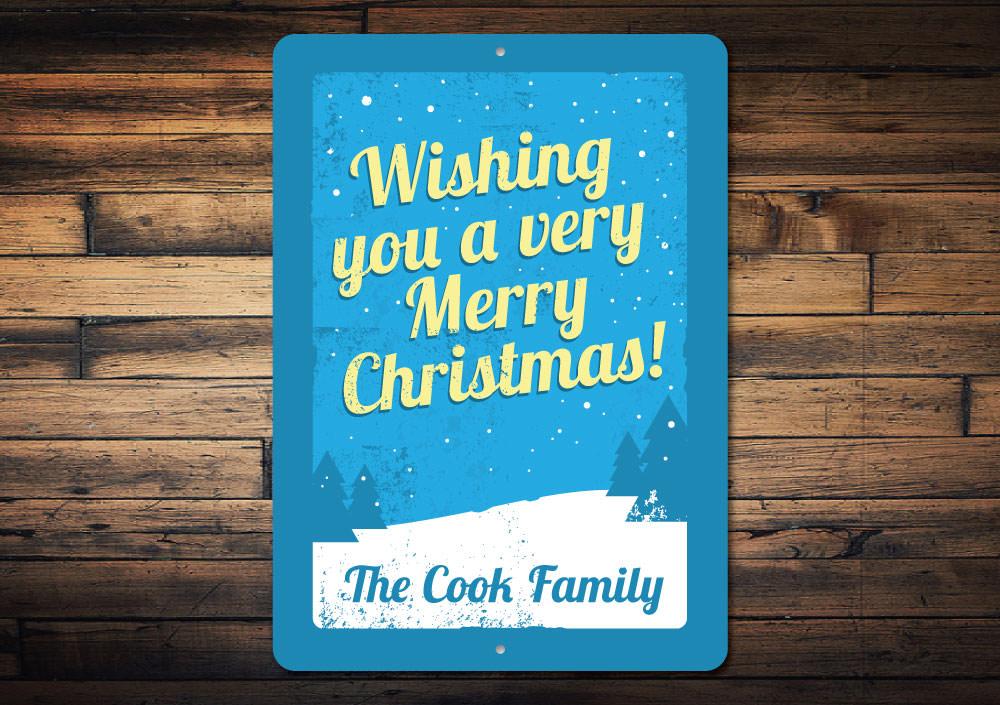 A festive Merry Christmas sign made of durable aluminum, featuring vibrant colors and a charming design, perfect for holiday decorations.