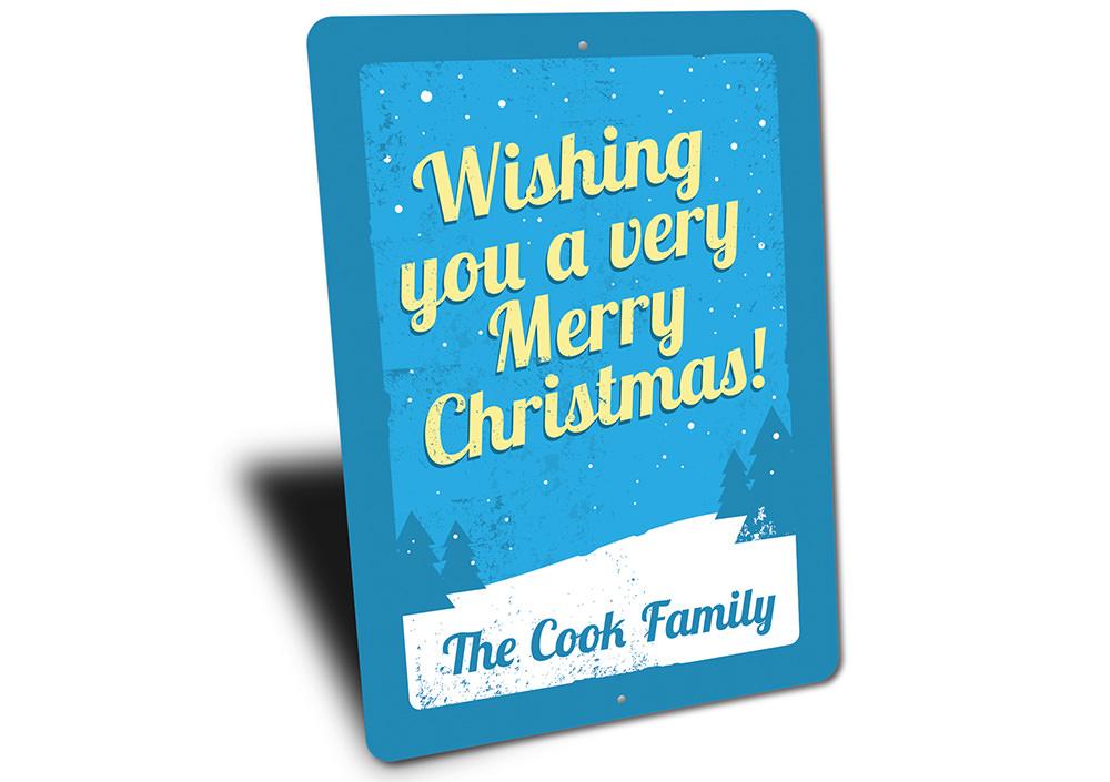 A festive Merry Christmas sign made of durable aluminum, featuring vibrant colors and a charming design, perfect for holiday decorations.