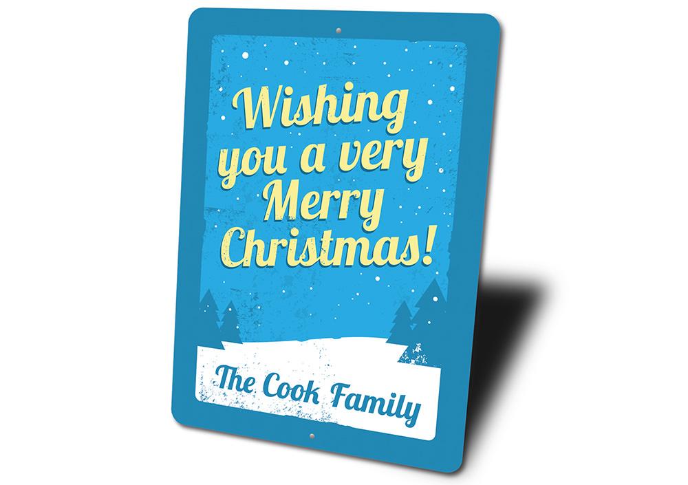 A festive Merry Christmas sign made of durable aluminum, featuring vibrant colors and a charming design, perfect for holiday decorations.