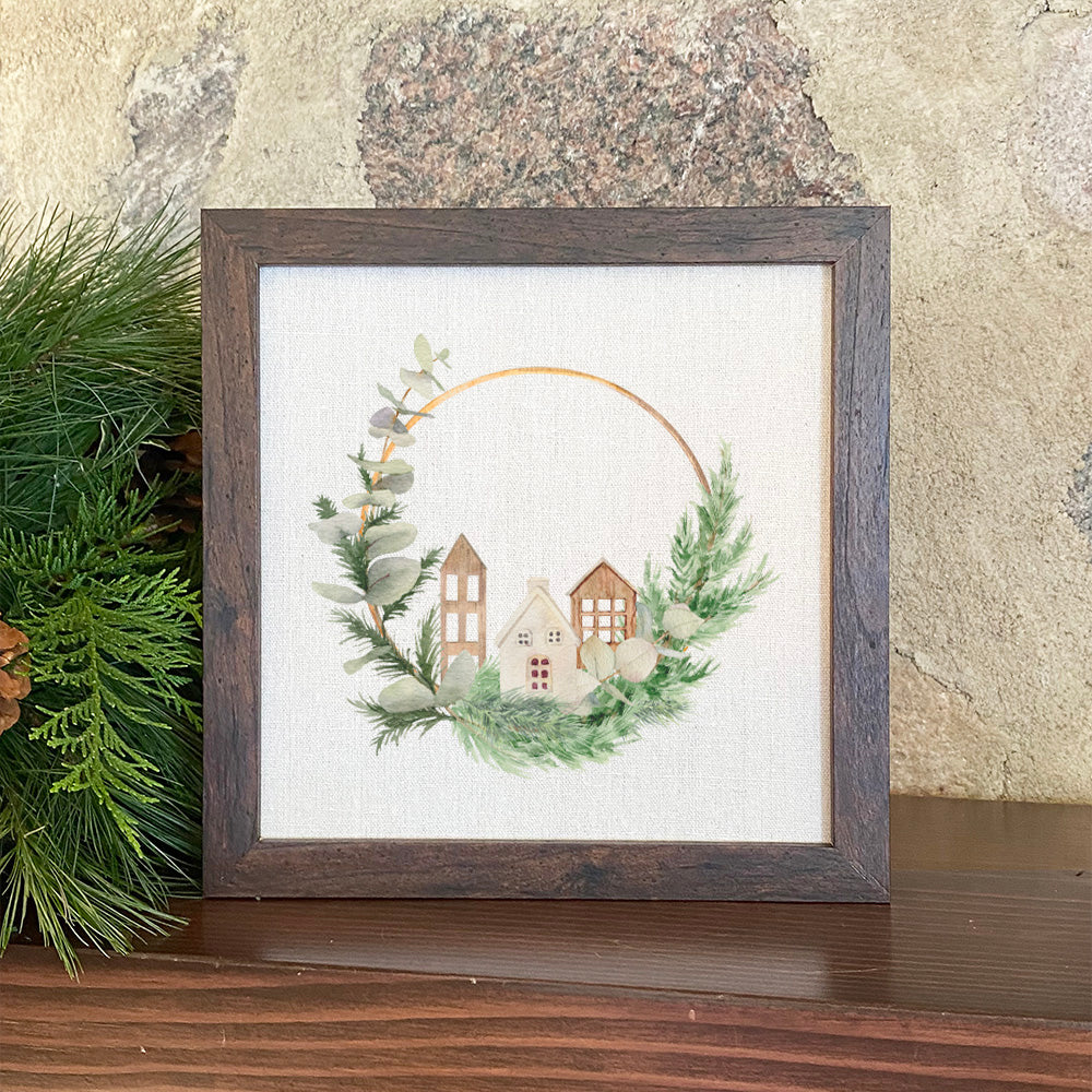 Wood Village Wreath - Framed Sign with a stylized wood frame, eco-friendly ink printing on a linen-look background.