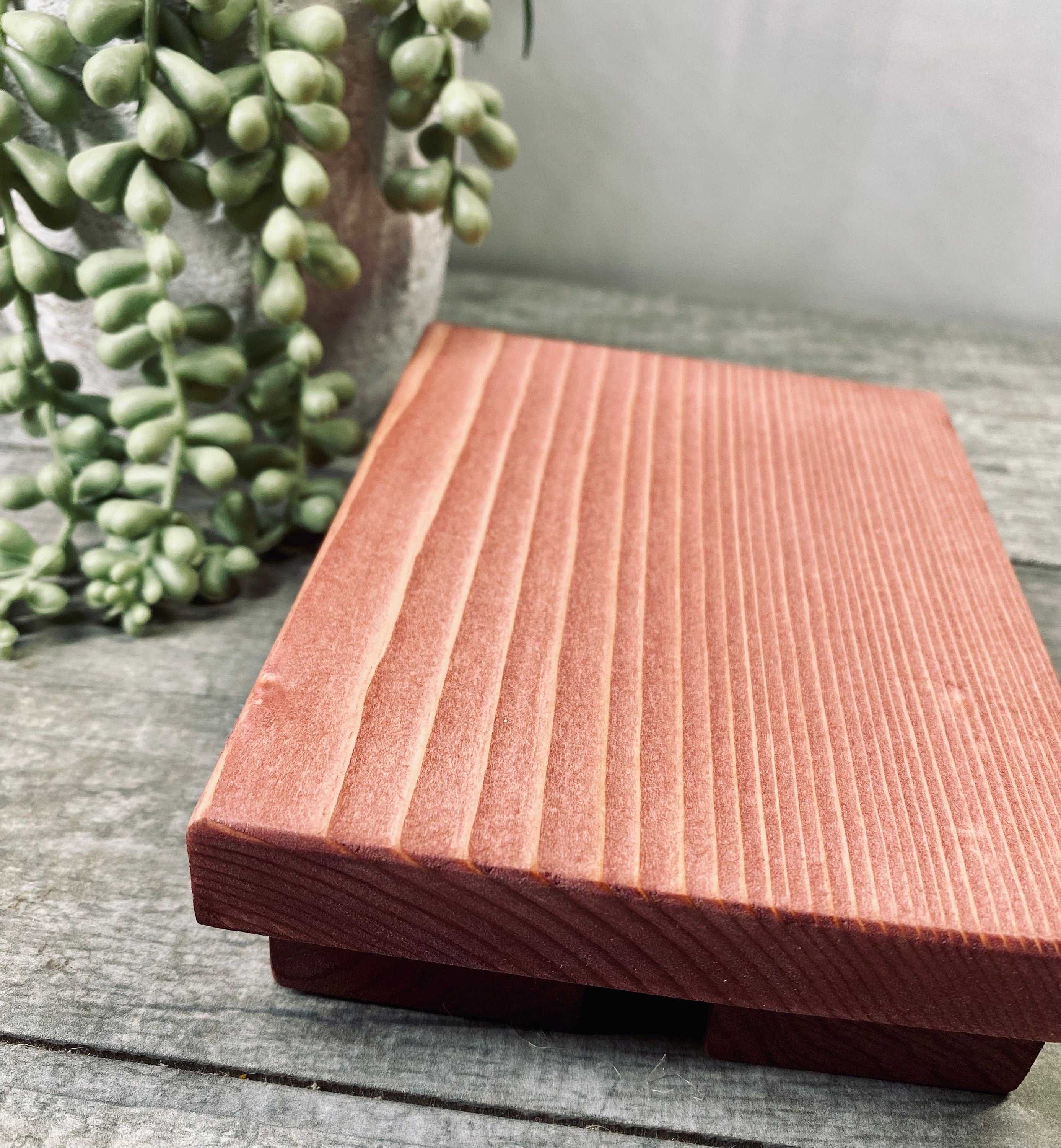 Handmade Wooden Farmhouse Riser in Sedona Red, showcasing its solid pine wood construction and unique grain patterns.