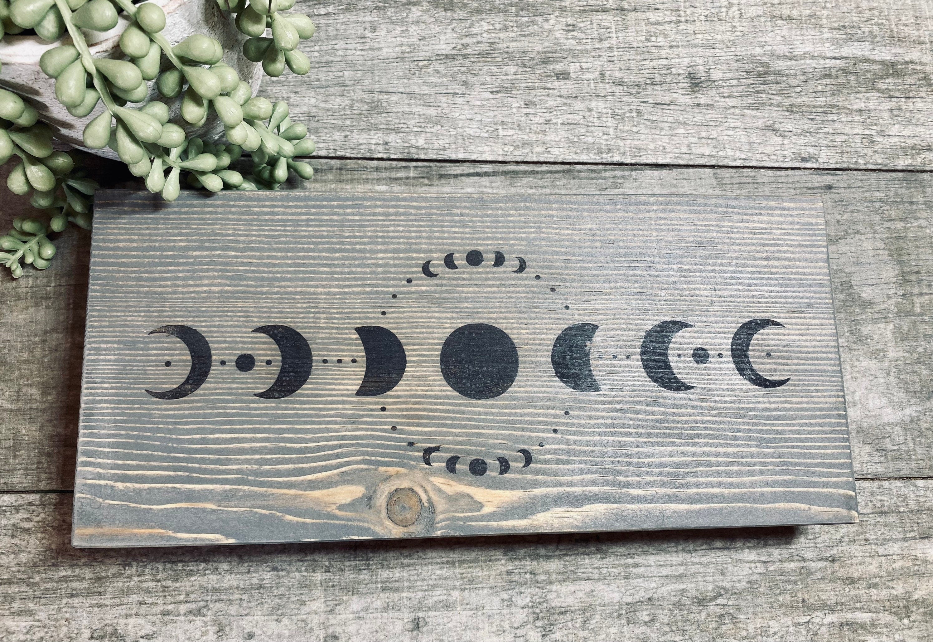 Handmade Wooden Moon Phase Riser with unique design, perfect for displaying candles or plants.