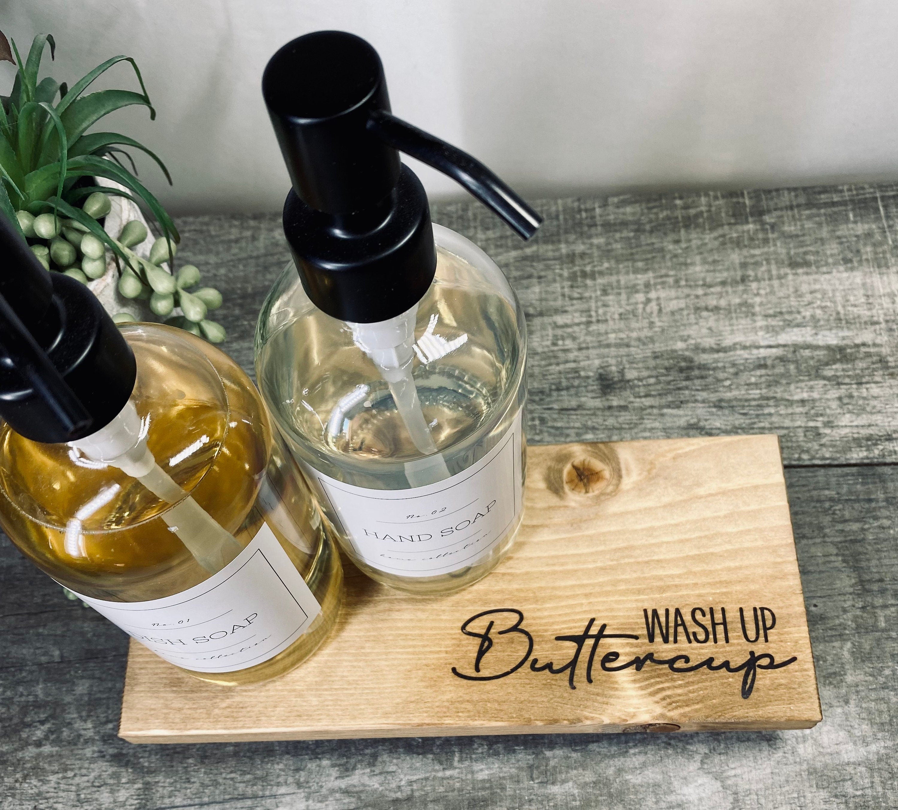 Handmade wooden riser with 'wash up buttercup' design, showcasing unique wood grain and oil-based stain, perfect for bathroom or kitchen decor.