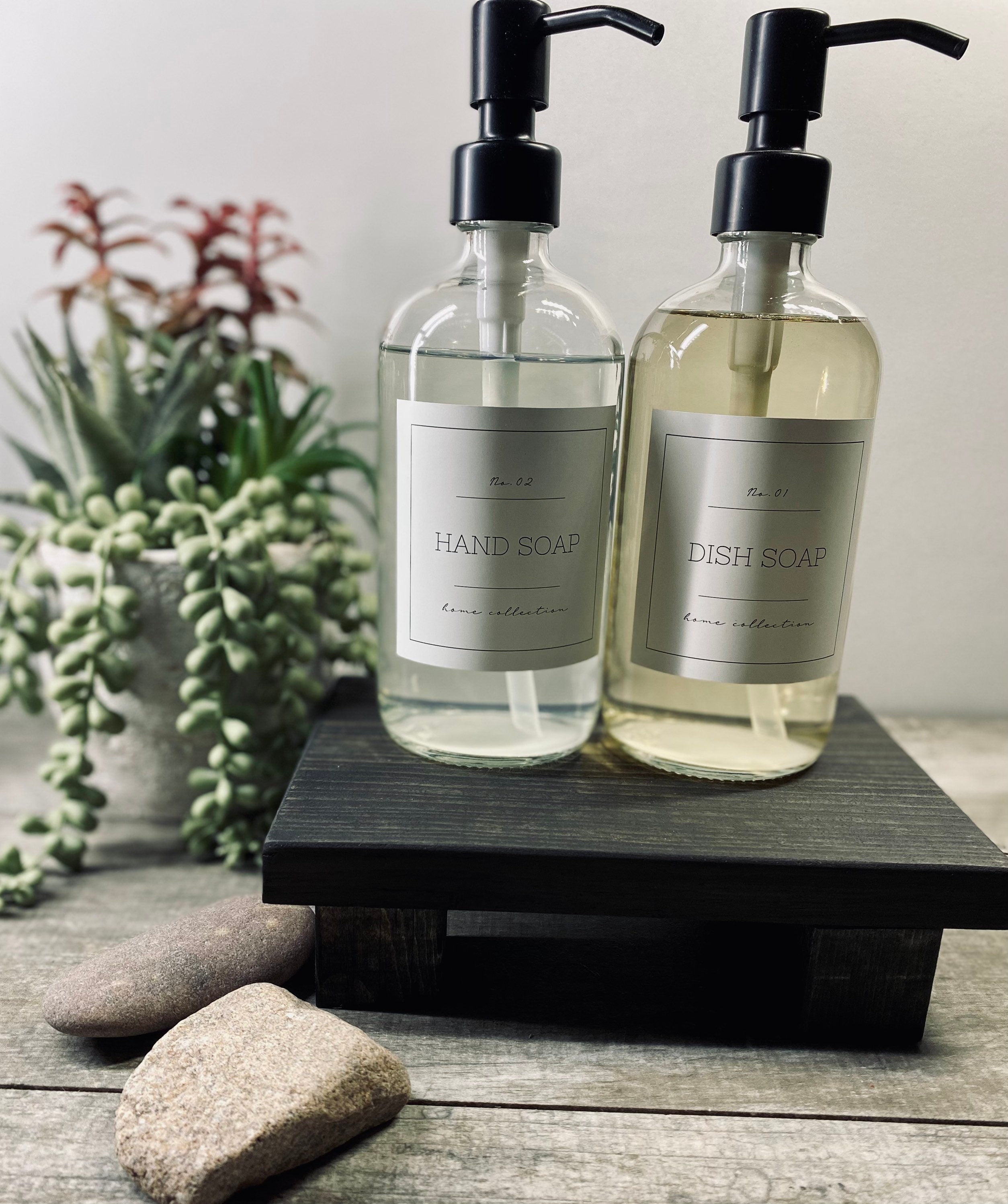 Handmade wooden riser in black stain, perfect for displaying soaps, candles, or plants, showcasing unique wood grain patterns.