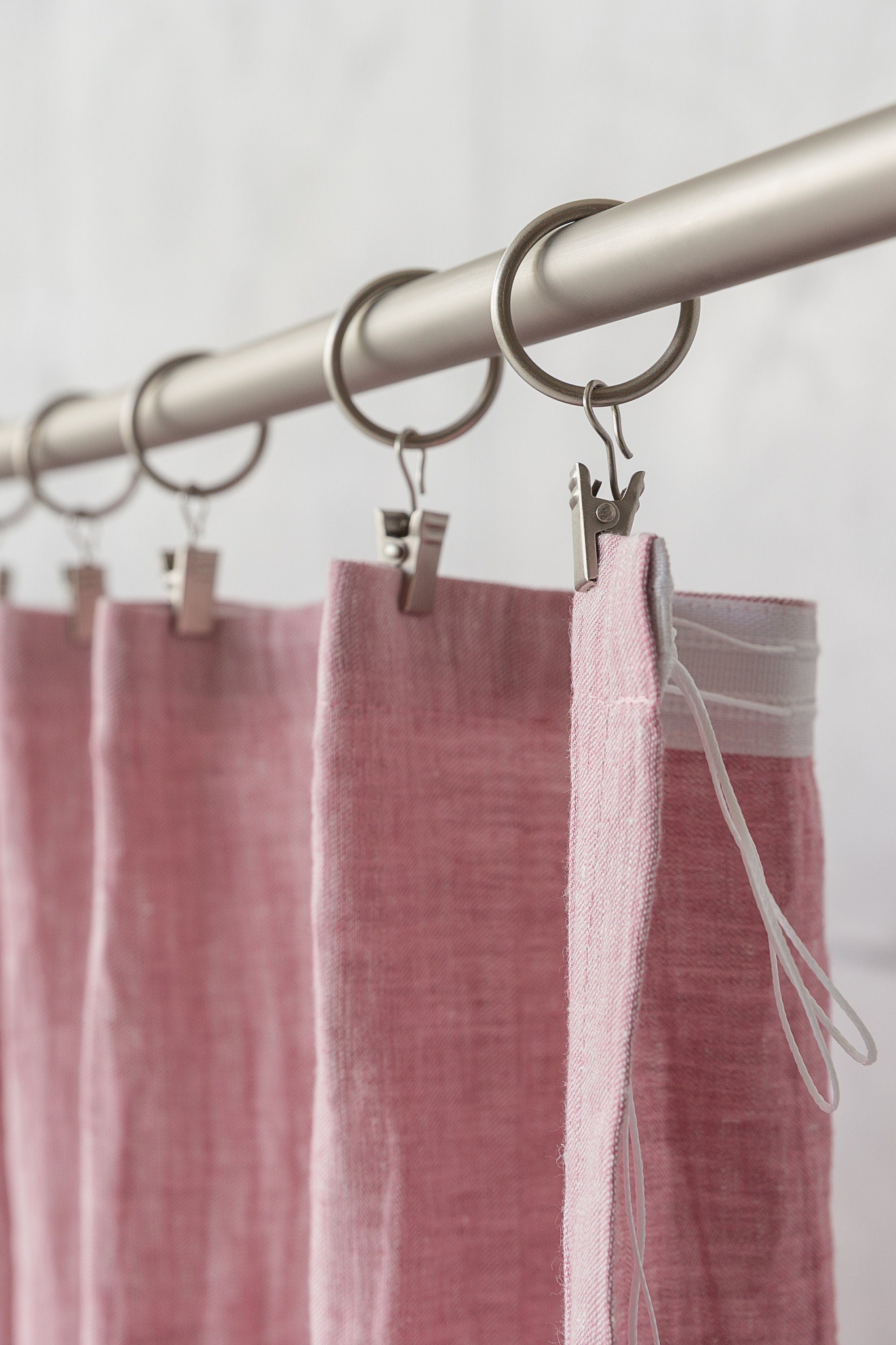Woodrose linen curtain with pleating tape, showcasing its elegant design and natural fabric texture.