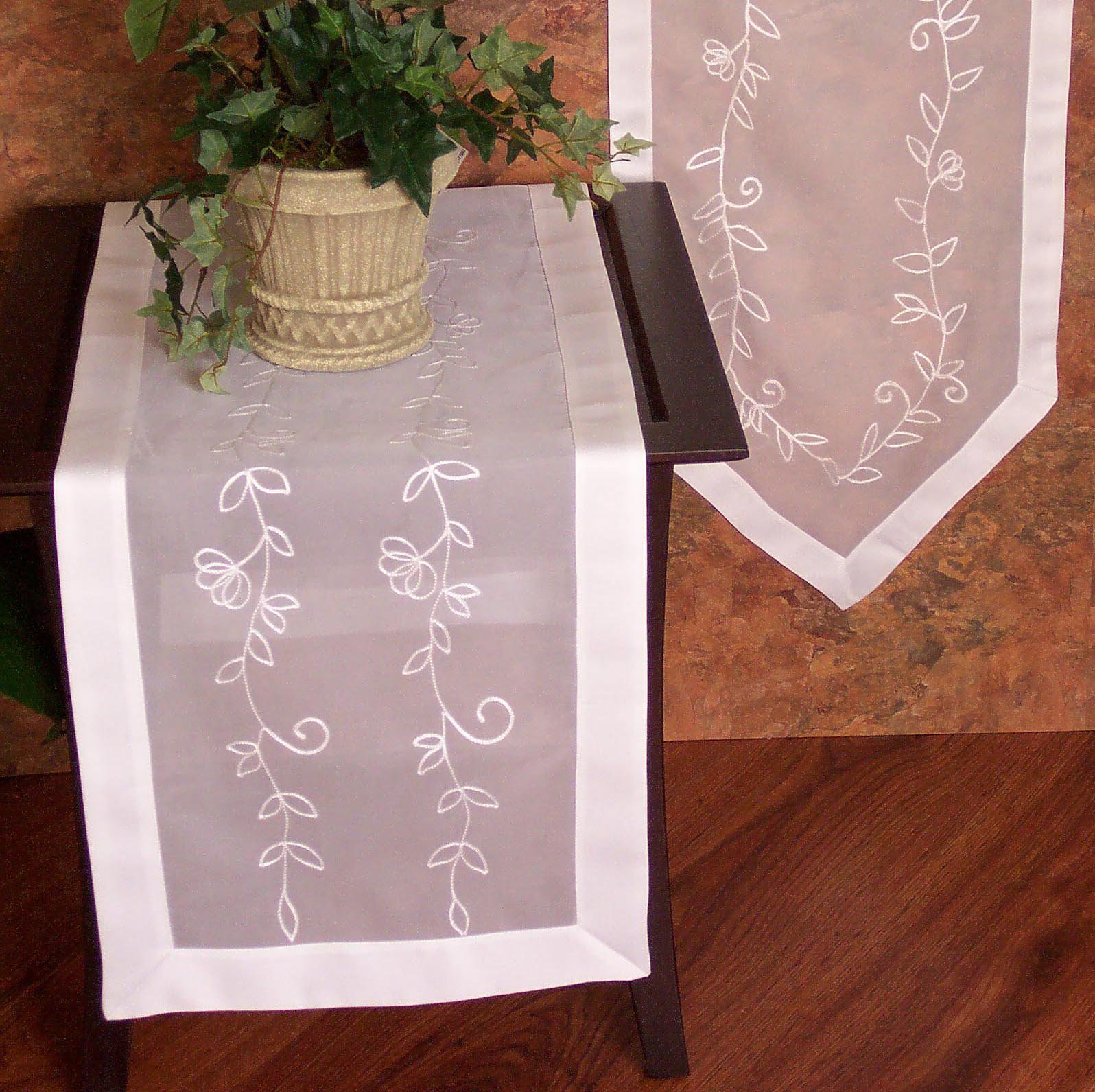 XD02011 Elegant Sheer Collection table linen featuring intricate flower embroidery on sheer fabric, perfect for elegant dining settings.