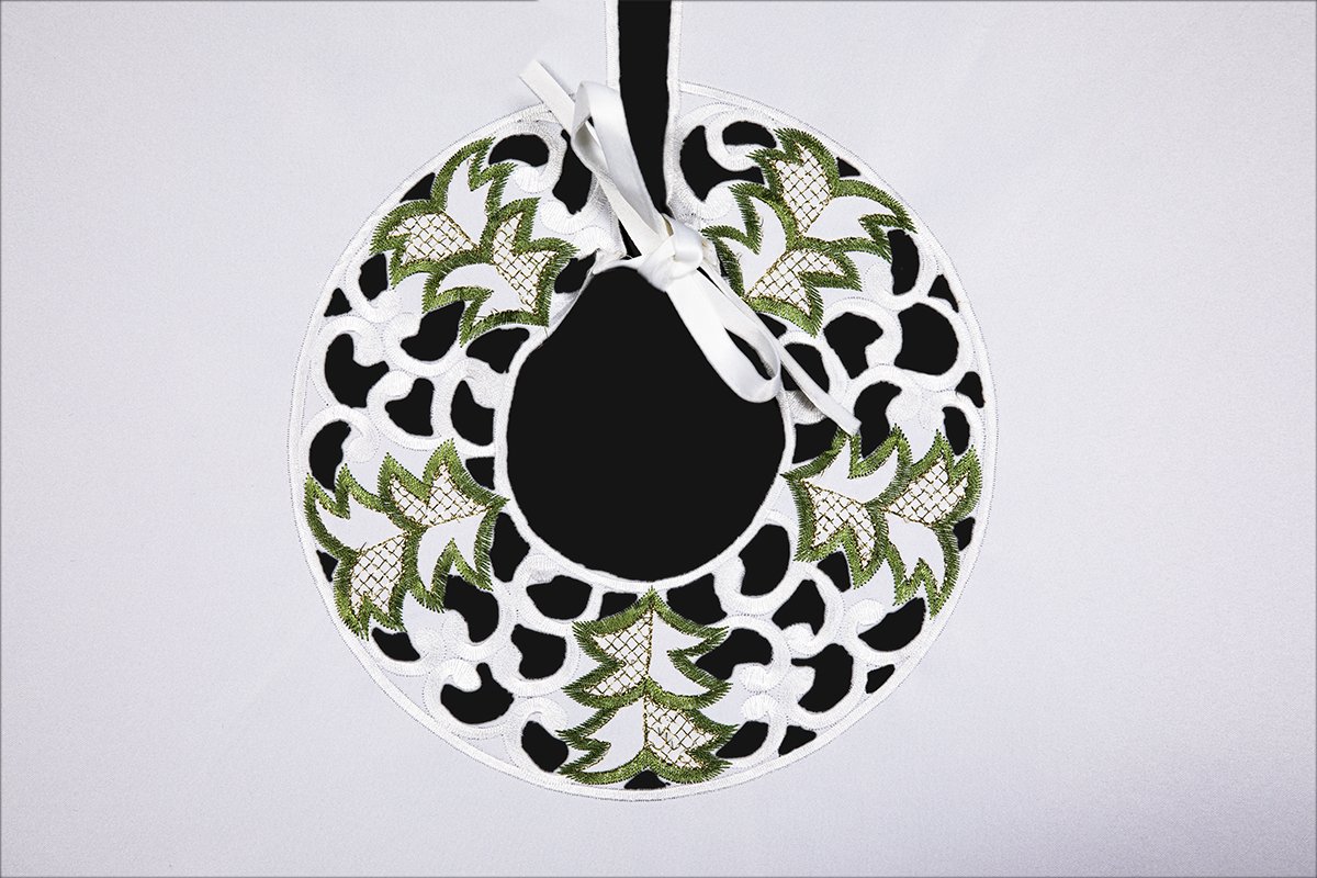 XD110708 Tannenbaum Tree Skirt, 48-inch round with intricate Christmas tree embroidery on a crisp white background.