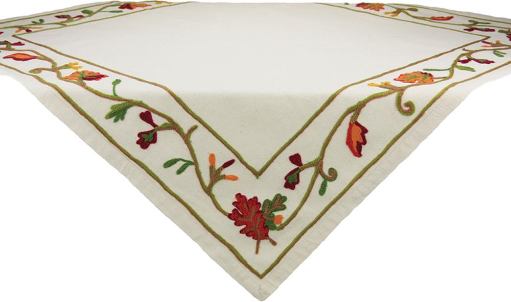 XD10813 Harvest Vine Table Topper featuring intricate crewel embroidery on a soft cotton muslin background, perfect for holiday gatherings.