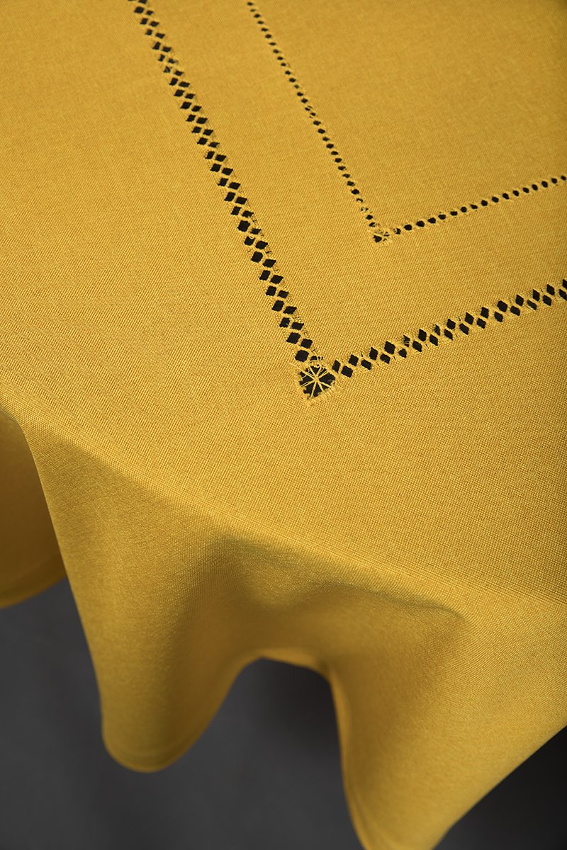 XD11099 Double Hemstitch Tablecloth in various colors with intricate cutwork trim, perfect for elegant dining settings.