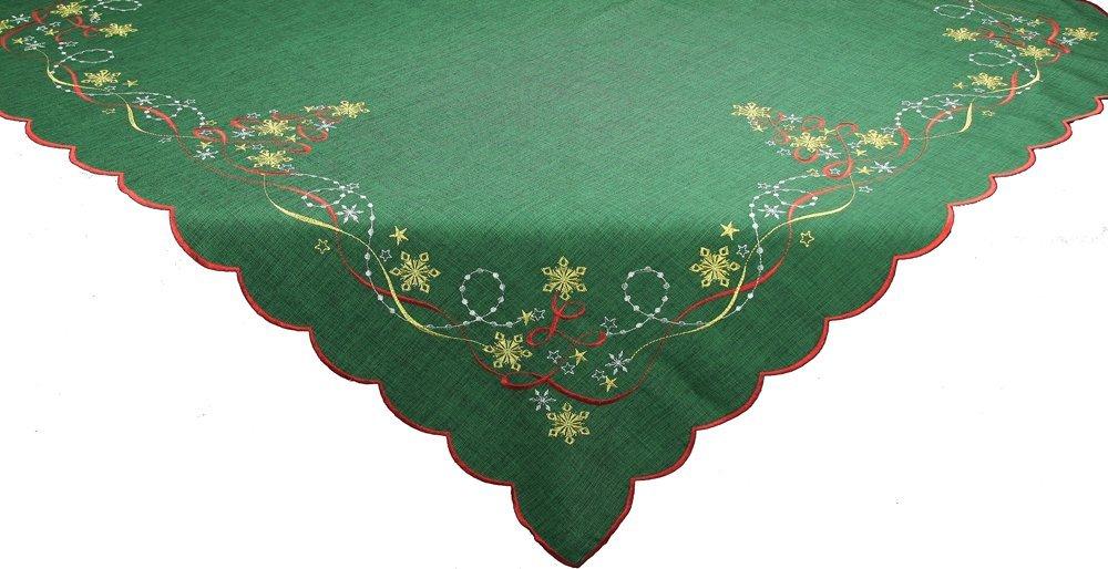 XD13194 Magical Christmas Table Topper featuring embroidered snowflakes and stars on an evergreen background, perfect for holiday decor.
