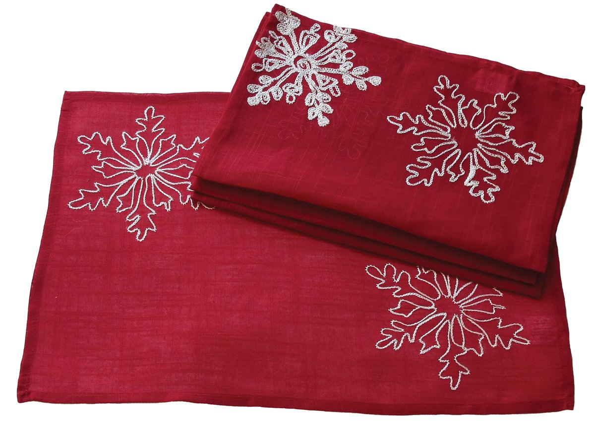 Set of four XD14103 Snowflake Placemats in classic red with intricate snowflake embroidery, perfect for holiday dining.