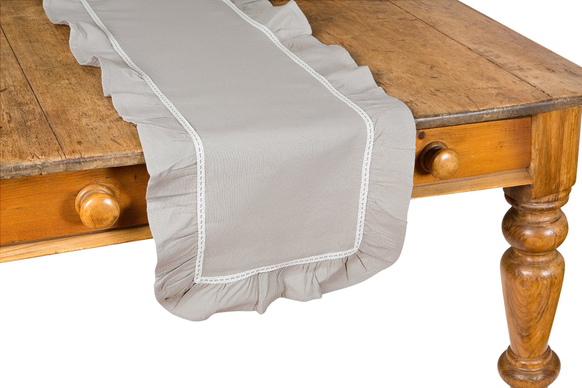 XD15110 Ruffle Trim Table Runner featuring taupe fabric and white lace accents, elegantly styled for dining decor.