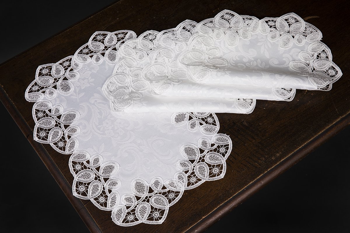 Set of 4 XD17190 Antebella Lace Placemats featuring intricate cutwork and elegant floral designs on pure white polyester fabric.