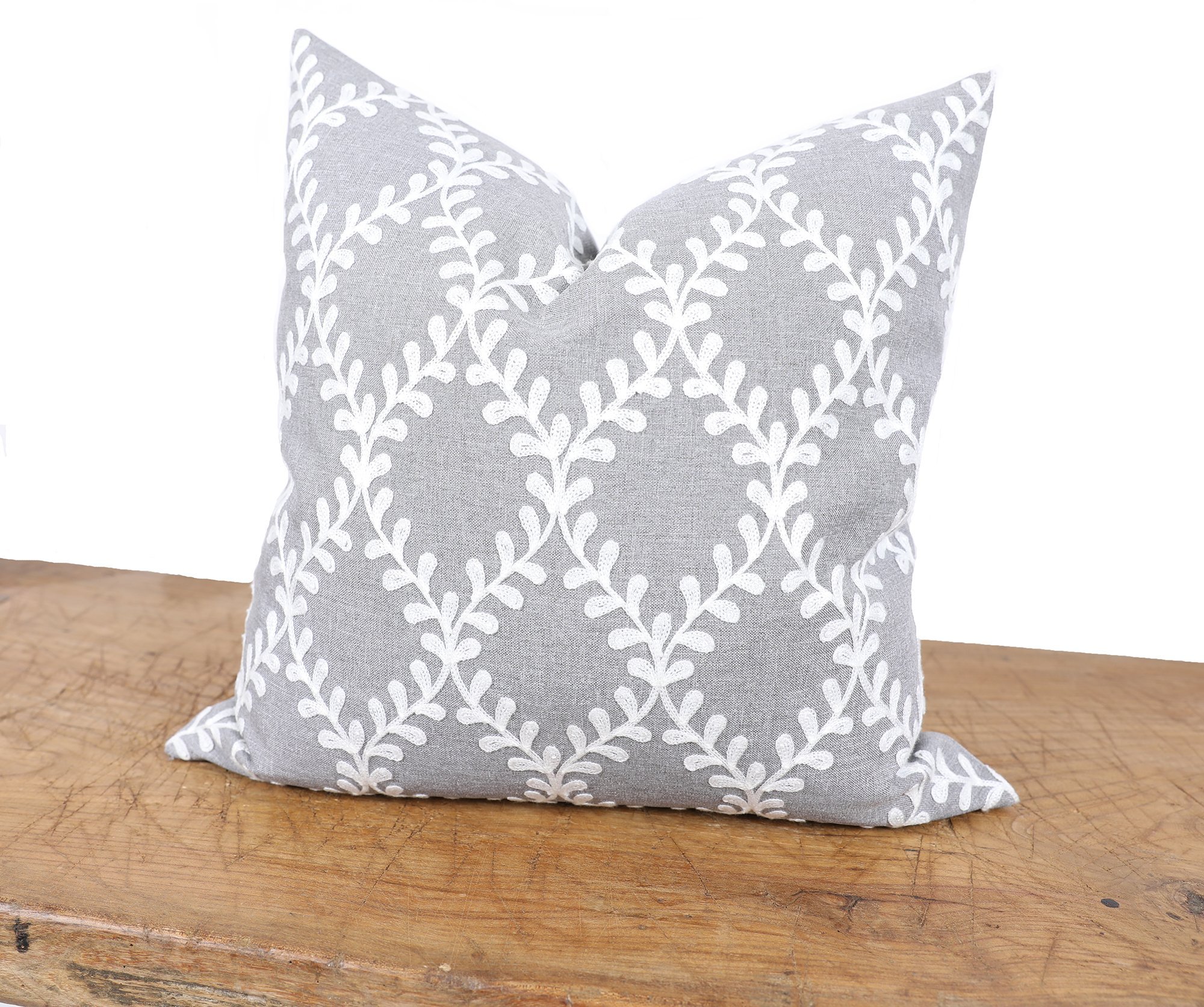XD19200-Piluki Leaf Crewel Embroidered Pillow featuring off-white leaves on textured gray fabric, 20 by 20 inches.