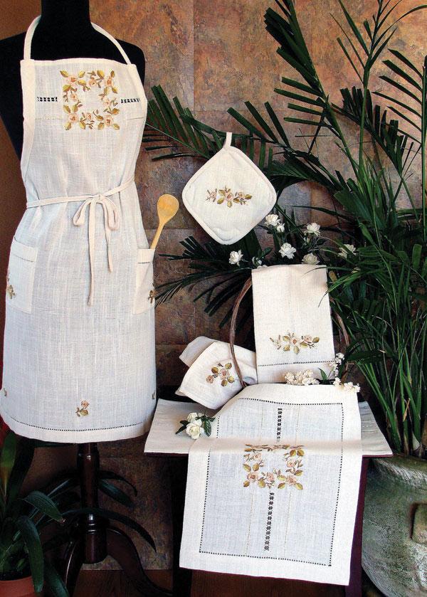 XD67801 Crewel Rose Collection featuring elegant flower embroidery and hand-rendered cutwork on table linens.