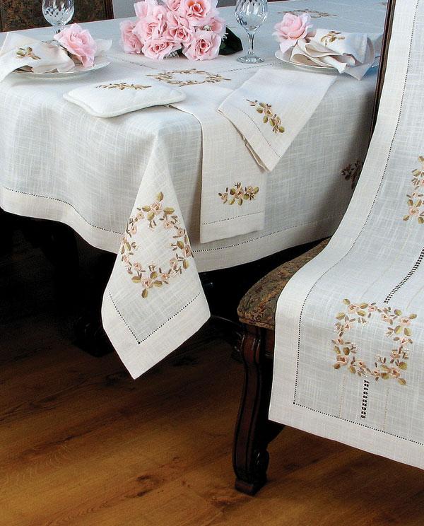 XD67801 Crewel Rose Collection featuring elegant flower embroidery and hand-rendered cutwork on table linens.