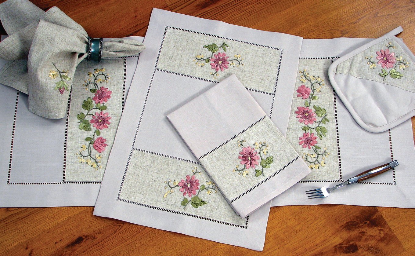 XD68049 Flower with Hemstitch Collection featuring beige linen with elegant ribbon flowers and intricate cutwork design.