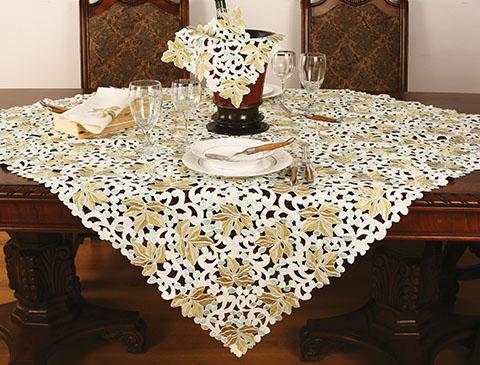 XD795025 Vineyard Collection table linens featuring embroidered grapes and vine designs with intricate cutwork pattern.