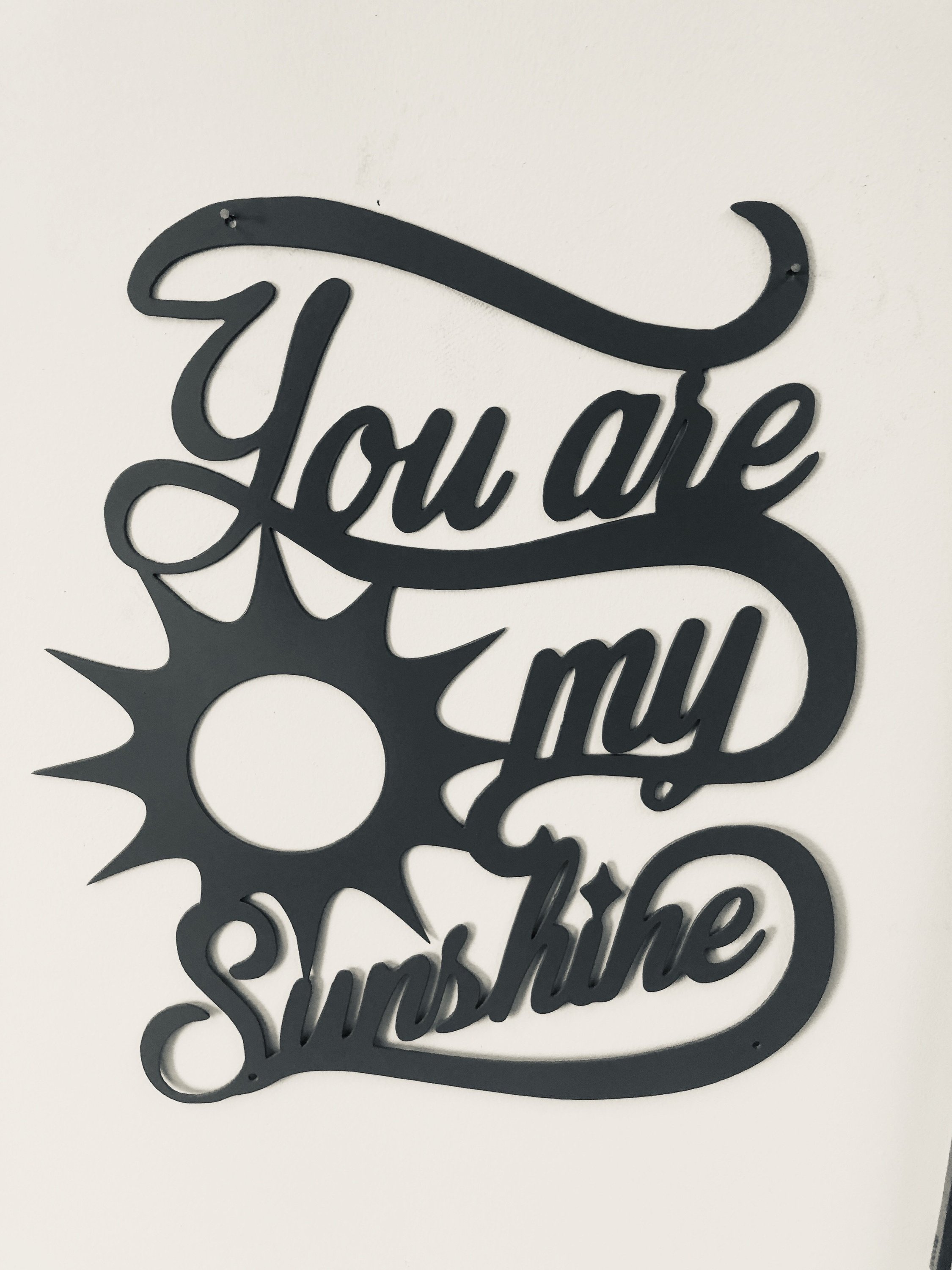 You Are My Sunshine Metal Wall Art in low gloss black, featuring an 18-inch design with a heartfelt message.