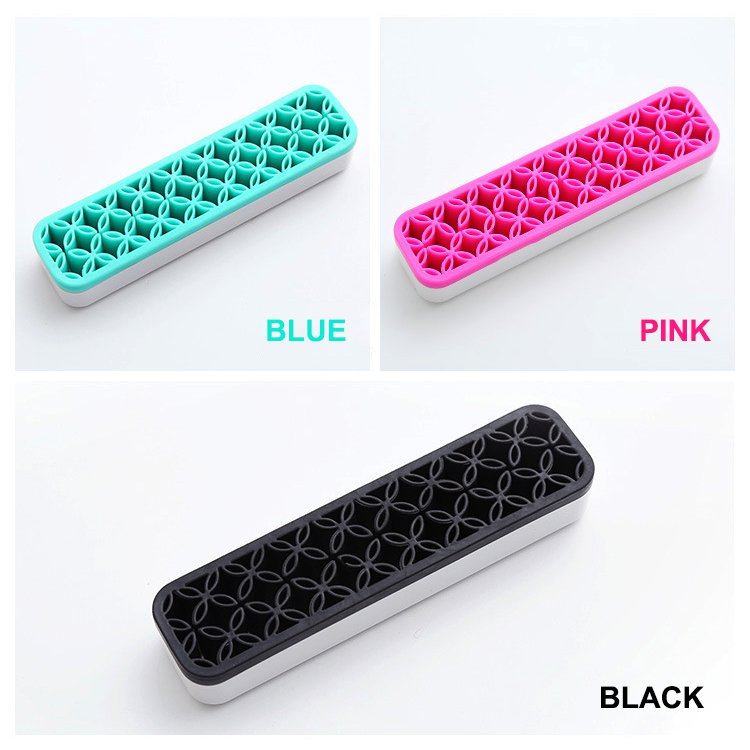 Three rectangular silicone soap holders.