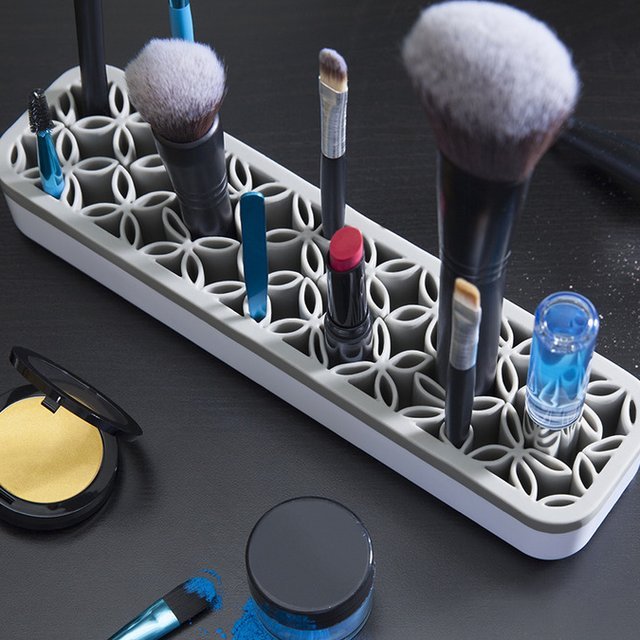 Makeup brushes and cosmetics organizer.