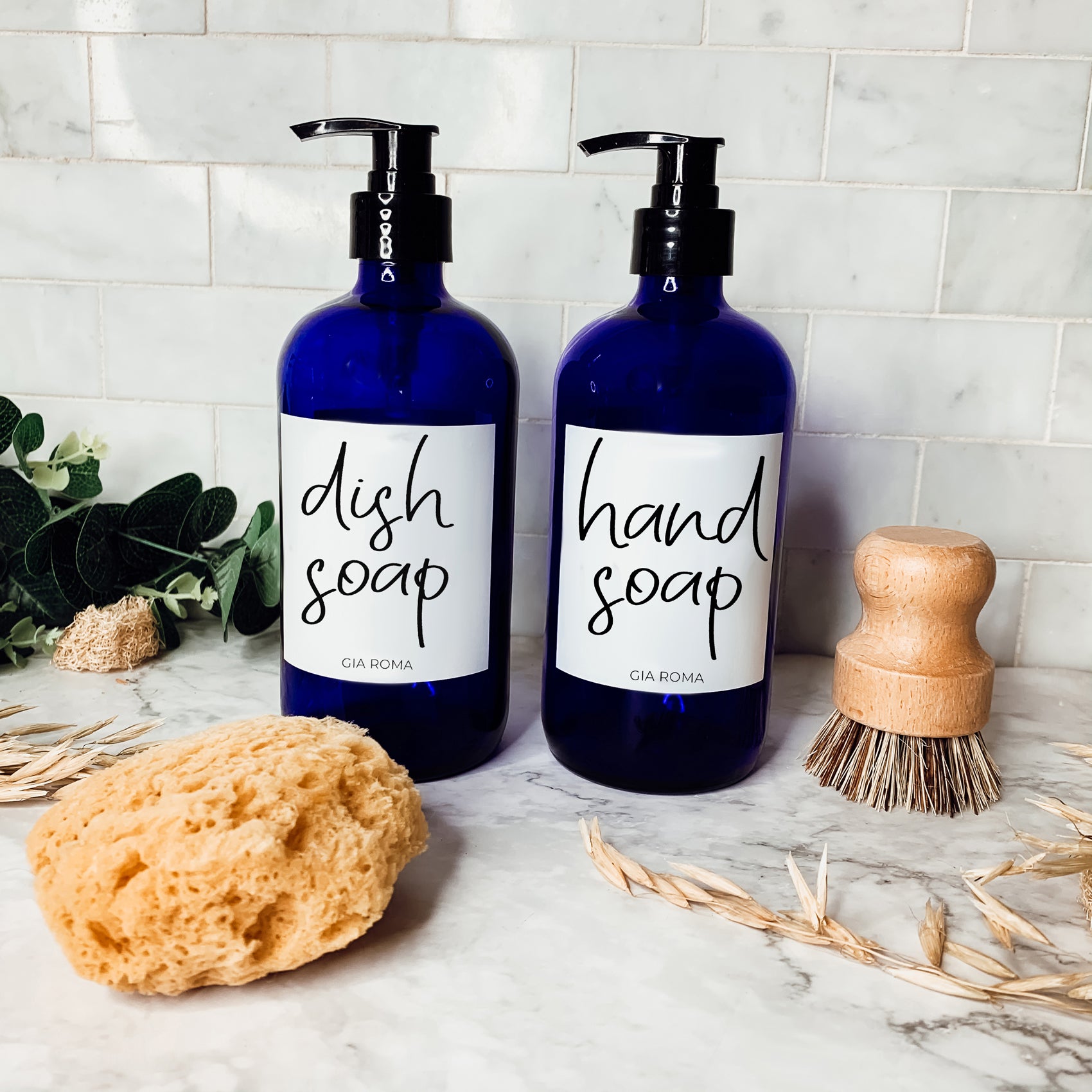 16oz blue glass dispenser with customizable waterproof labels, perfect for home decor.