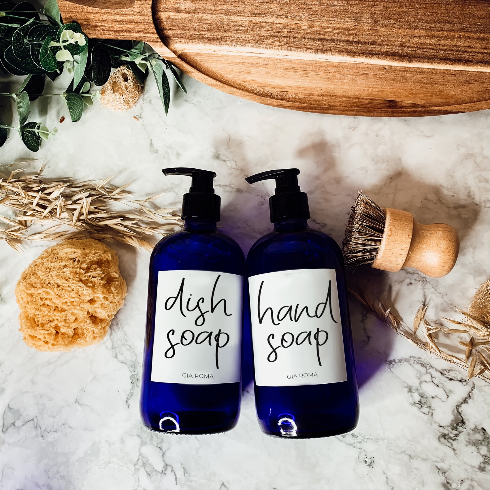 16oz blue glass dispenser with customizable waterproof labels, perfect for home decor.