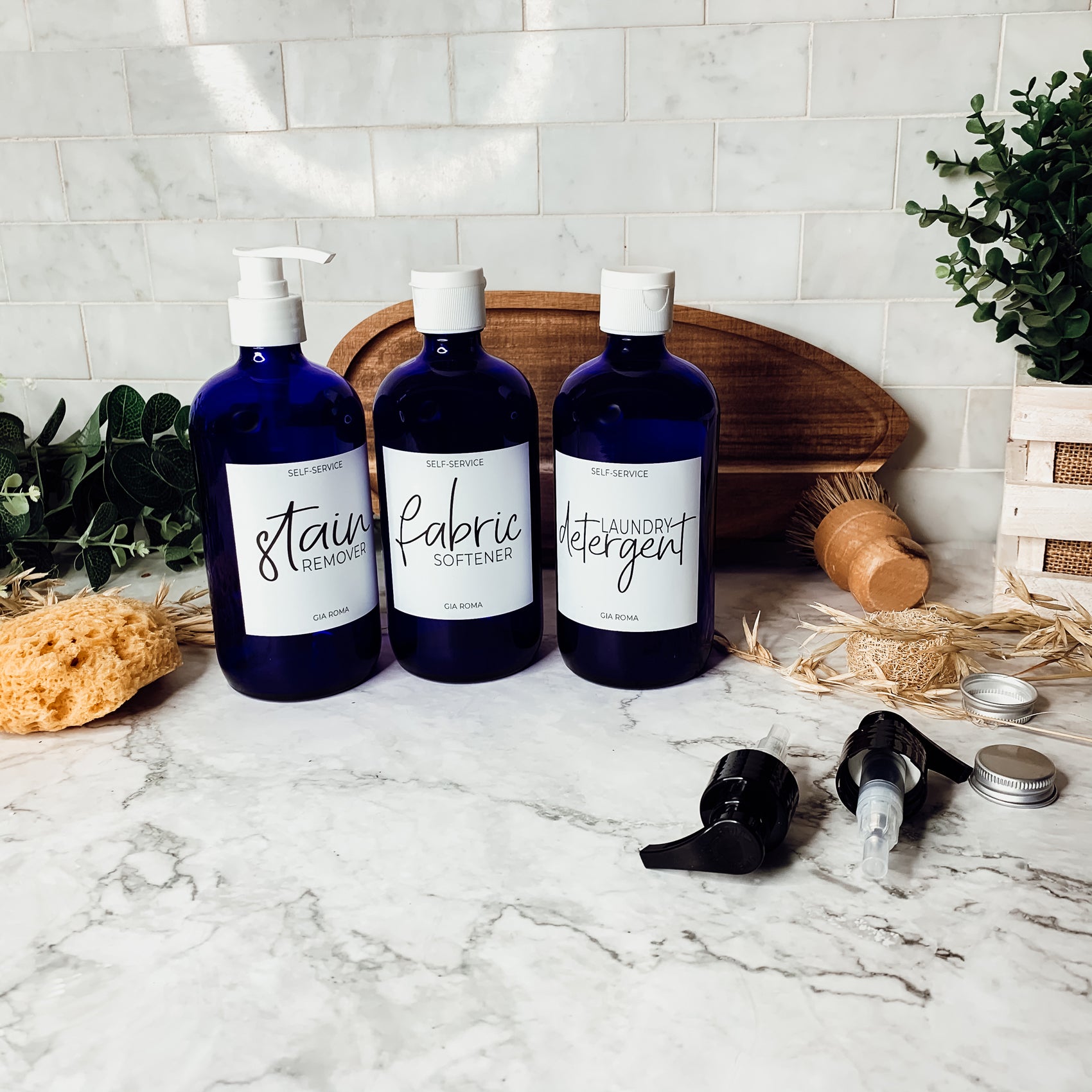 16oz blue glass dispenser with customizable waterproof labels, perfect for home decor.