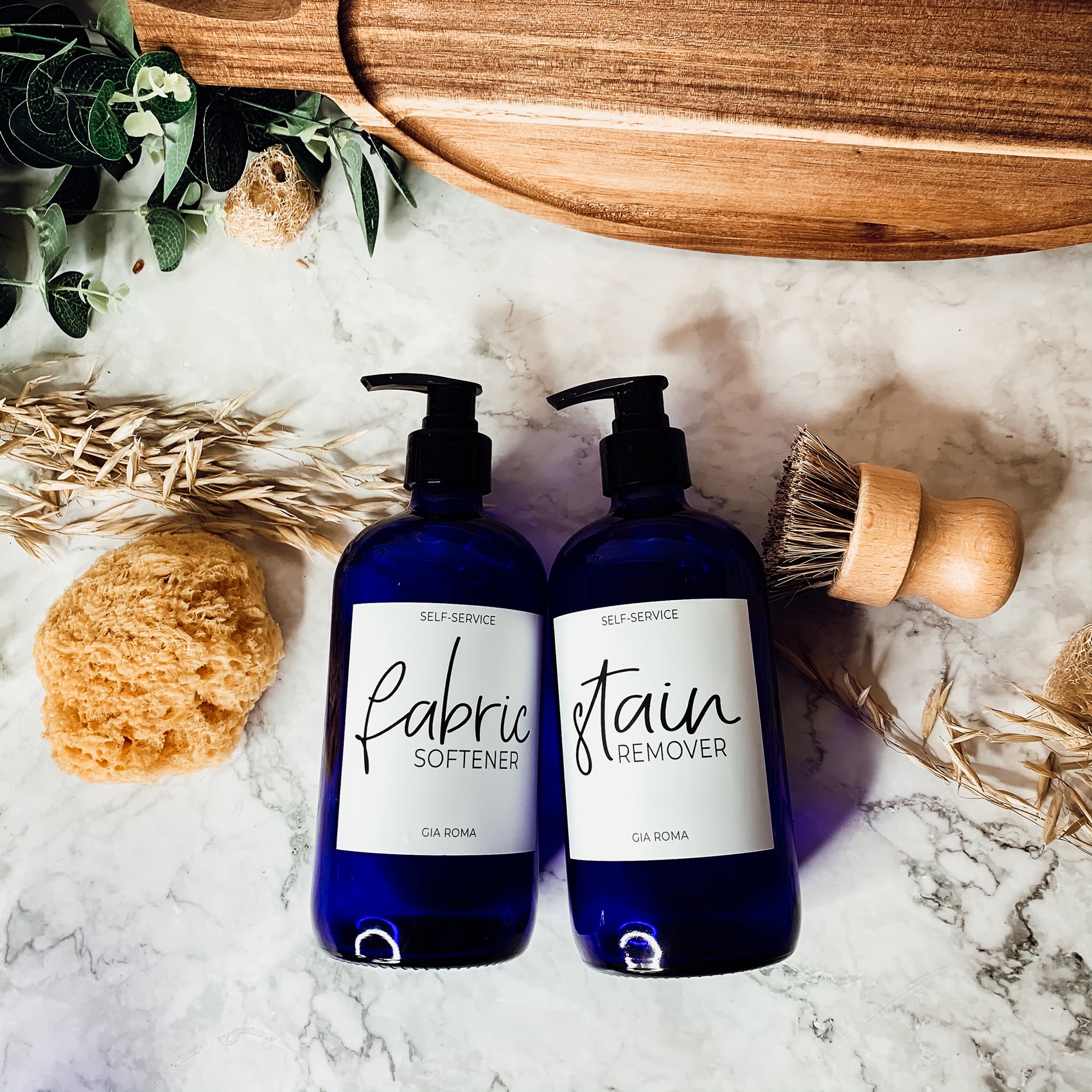 16oz blue glass dispenser with customizable waterproof labels, perfect for home decor.