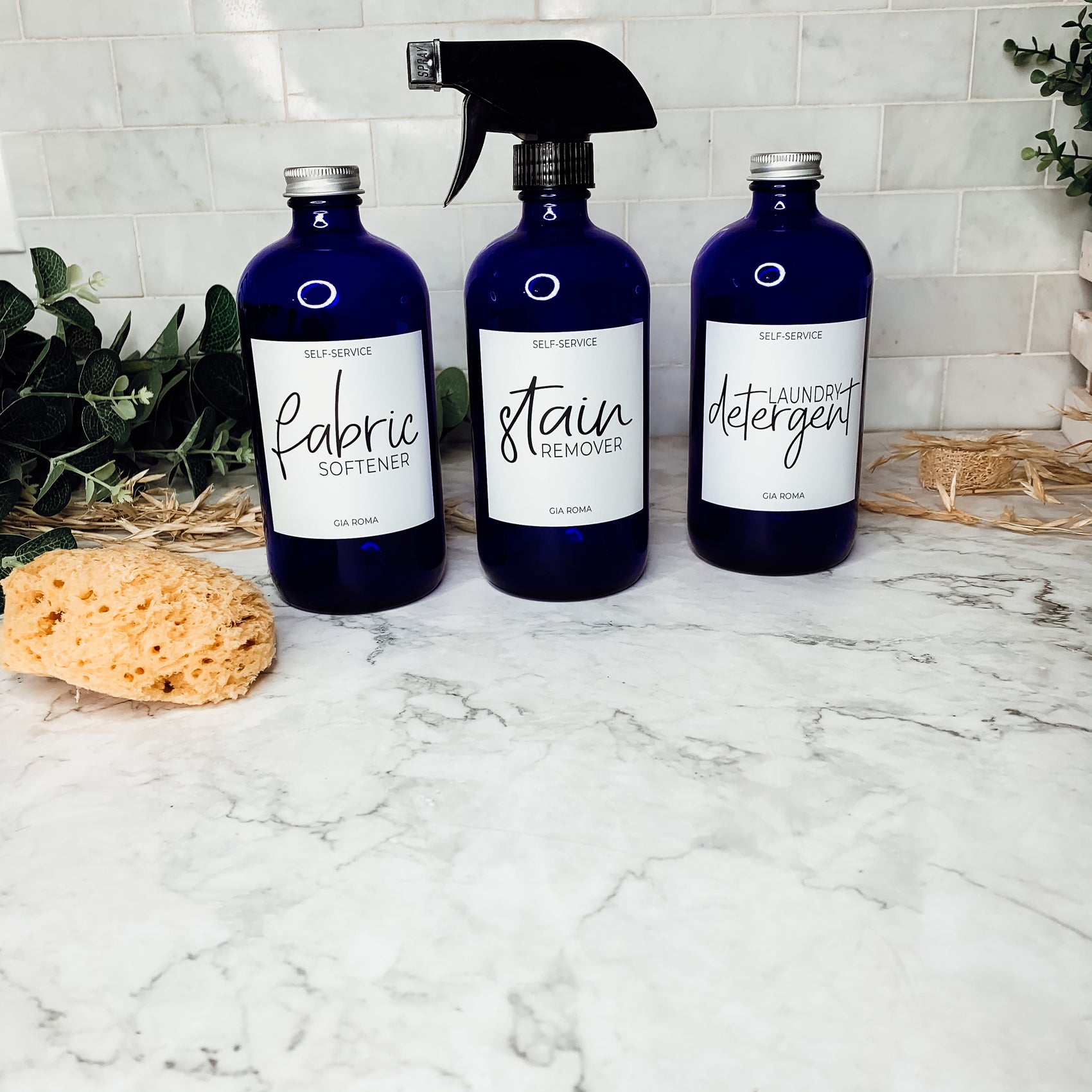 16oz blue glass dispenser with customizable waterproof labels, perfect for home decor.