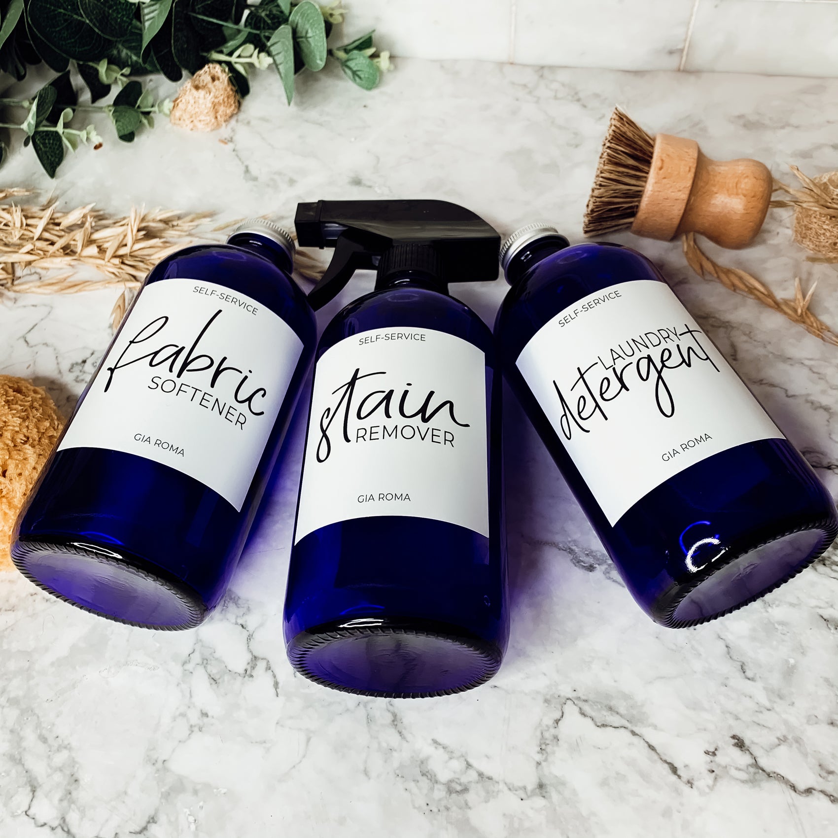 16oz blue glass dispenser with customizable waterproof labels, perfect for home decor.