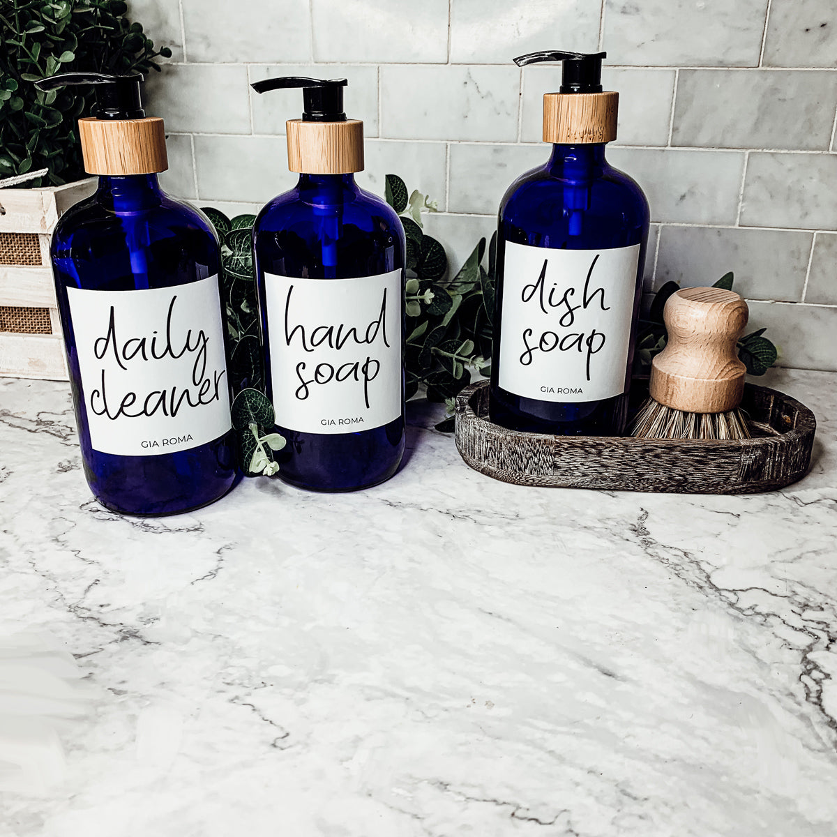 16oz blue glass dispenser with customizable waterproof labels, perfect for home decor.