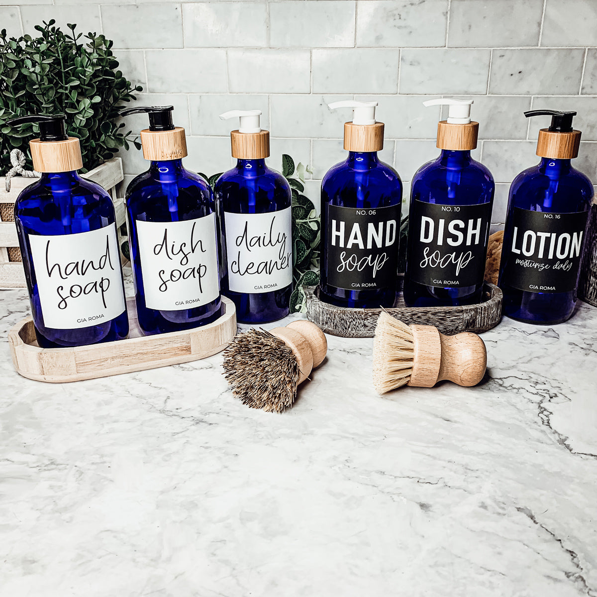 16oz blue glass dispenser with customizable waterproof labels, perfect for home decor.