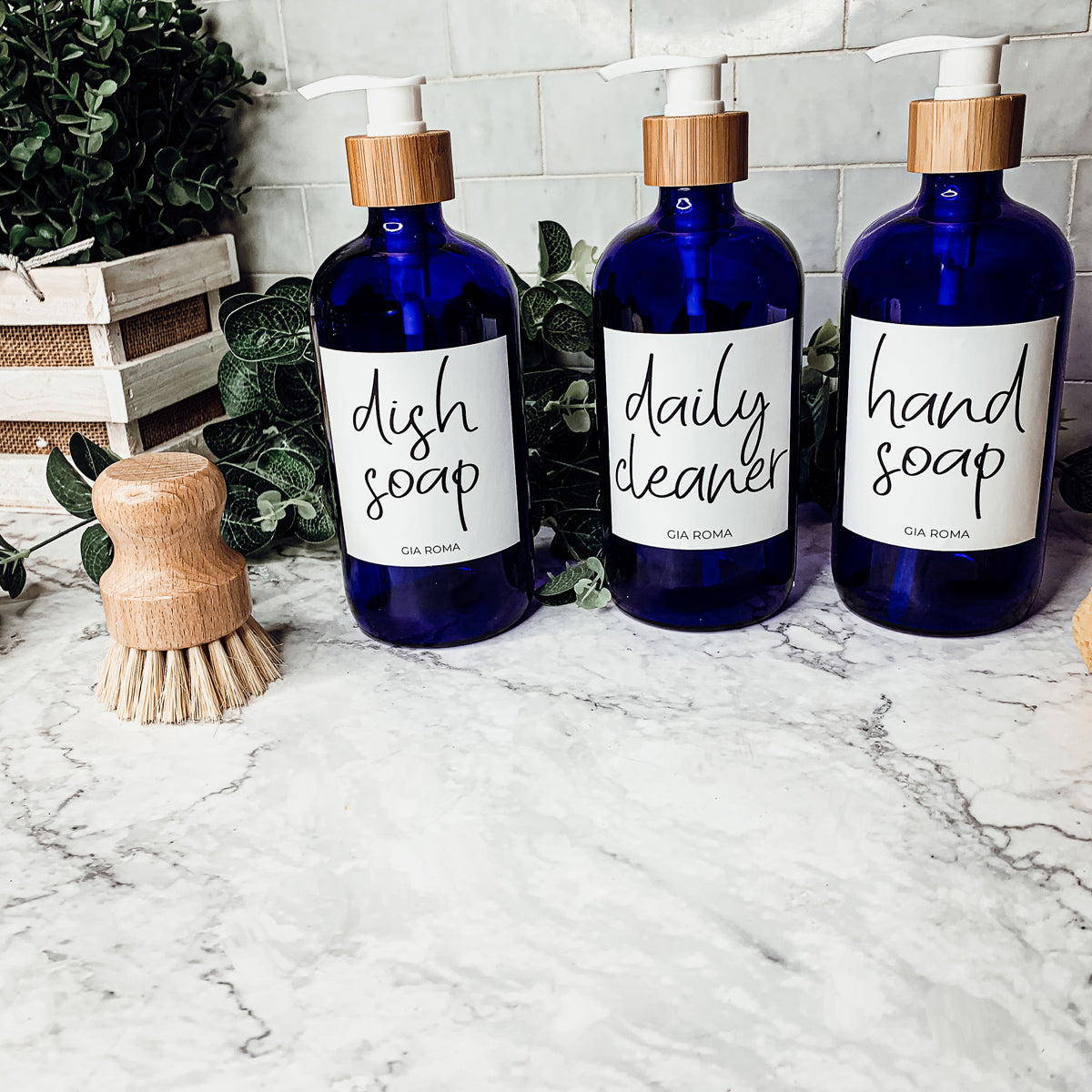 16oz blue glass dispenser with customizable waterproof labels, perfect for home decor.