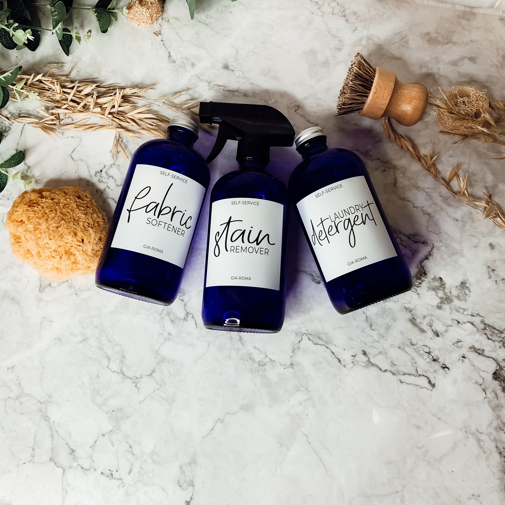 16oz blue glass dispenser with customizable waterproof labels, perfect for home decor.