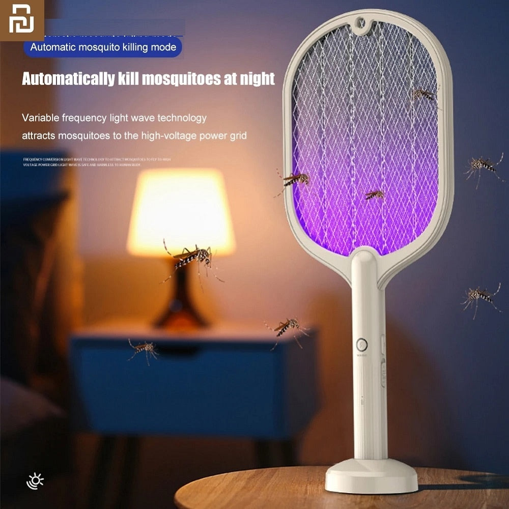2 In 1 Electric Insect Racket Swatter with USB charging and LED light, designed for effective mosquito and bug elimination.