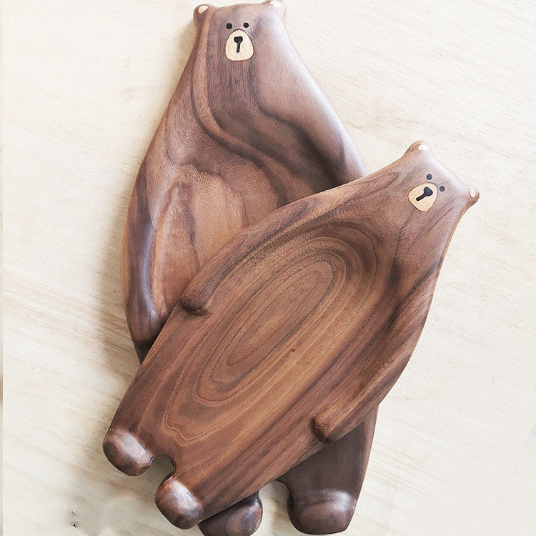 Cute bear-shaped wooden bread plate made from bamboo, featuring a creative design with inlaid details.