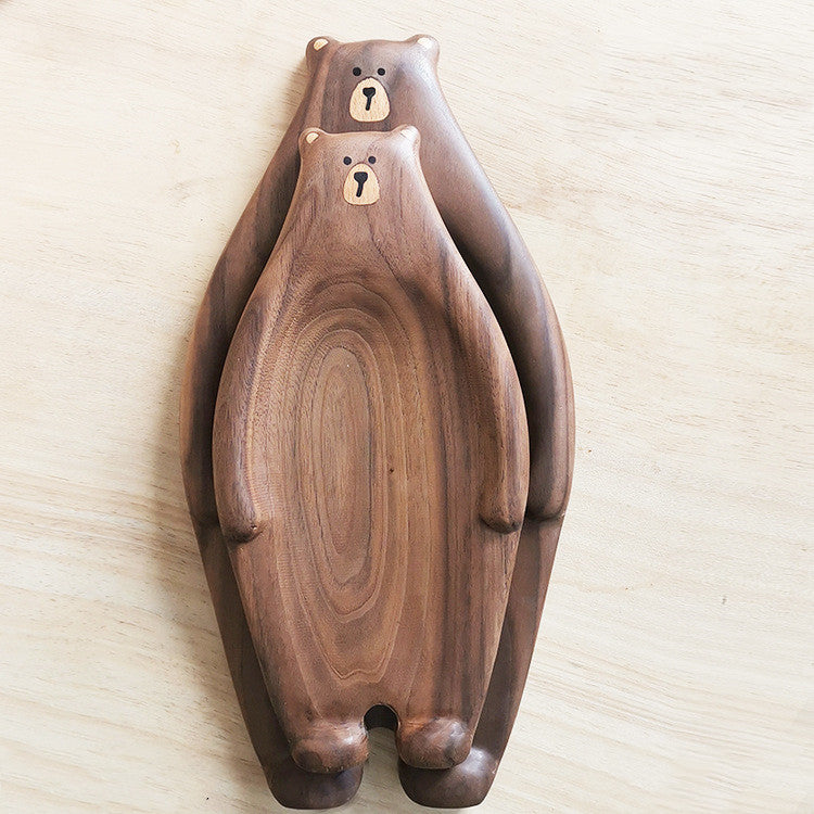 Cute bear-shaped wooden bread plate made from bamboo, featuring a creative design with inlaid details.