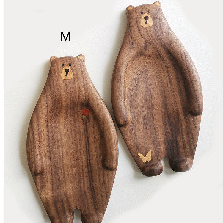 Cute bear-shaped wooden bread plate made from bamboo, featuring a creative design with inlaid details.