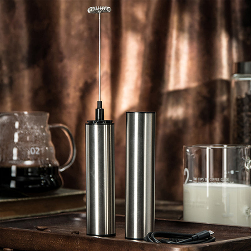 Handheld Electric Coffee Blender Milk Frother with stainless steel whisk and ABS plastic body, designed for frothing milk and mixing beverages.